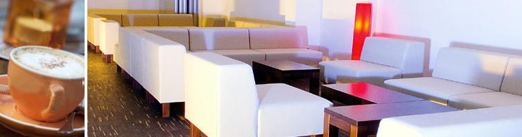 Bildleiste: Symbolfoto: Kaffeetasse und Einblick in die Lounge